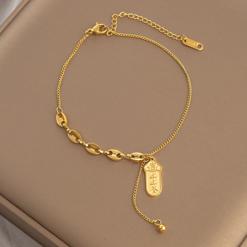 Tobillera con firma de oro