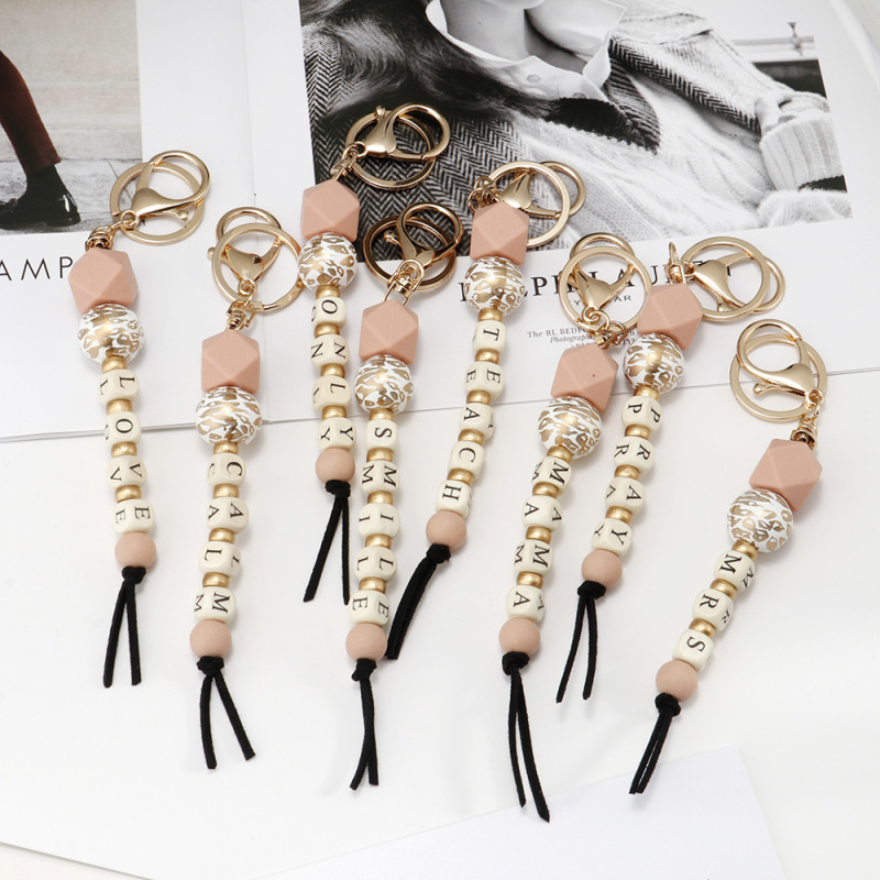 Cross-border hot selling Sami wind mama letter silicone beads key chain wave box bag pendant accessories spot wholesale Cross-border hot selling Sami wind mama letter silicone beads key chain wave box bag pendant accessories spot wholesale