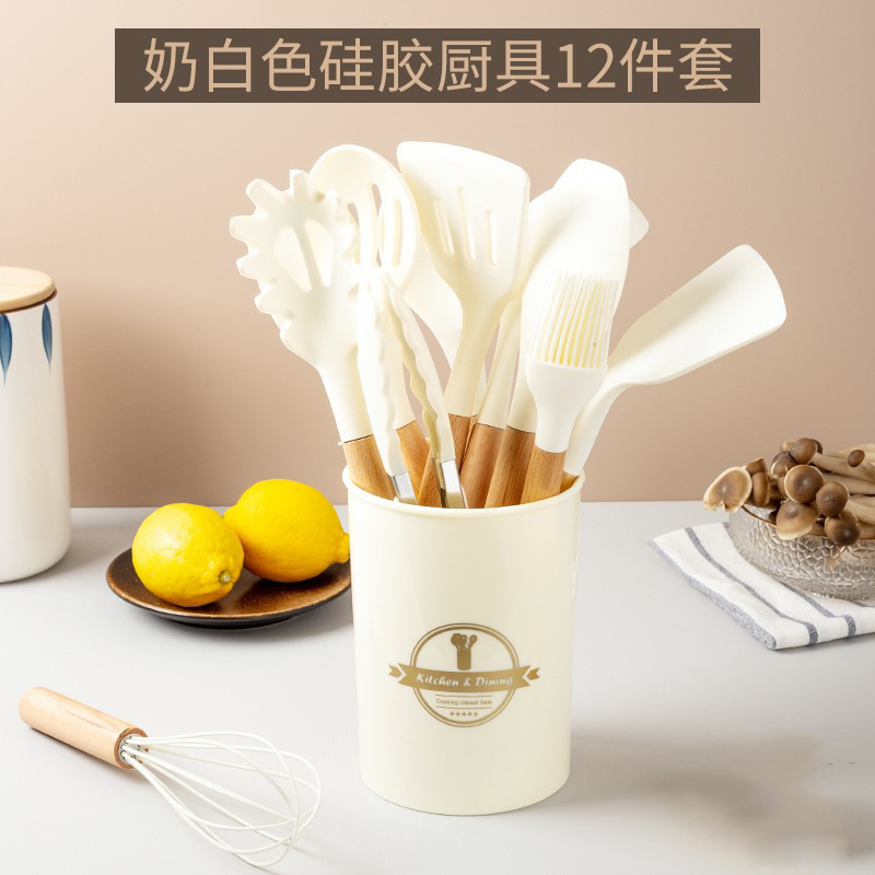 Herramientas de cocina para el hogar de silicona con mango de madera transfronterizo Juego de 12 piezas de olla antiadherente, pala, cuchara, juego de utensilios de cocina de silicona