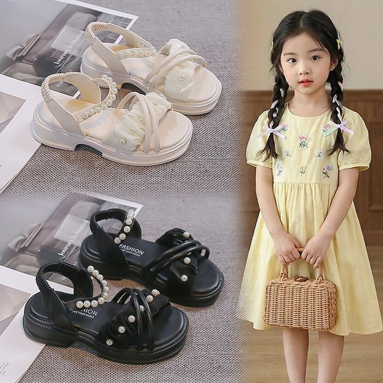 Sandalias de niñas 2026 verano nuevo estilo de moda para niños grandes zapatos de playa de perla plana princesa zapatos zapatos