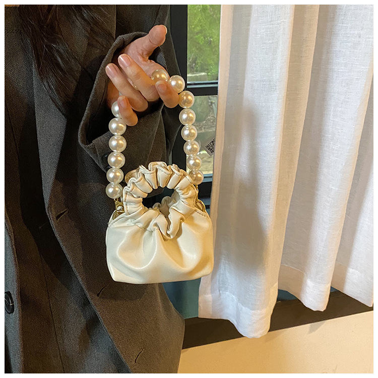 255g Weight Beading, Pearls Fashion Element Clasp Frame Closure Type Top Handle, Chain Strap Type Crossbody Bag Bags Type Casual, Daily, Shopping Occasion Pu Leather Material Solid Color Pattern All Seasons Season Kid'S Gender Cute Style Bucket Shape Kid'S Pu Leather Solid Color Cute Beading Pearls Bucket Clasp Frame Crossbody Bag 53