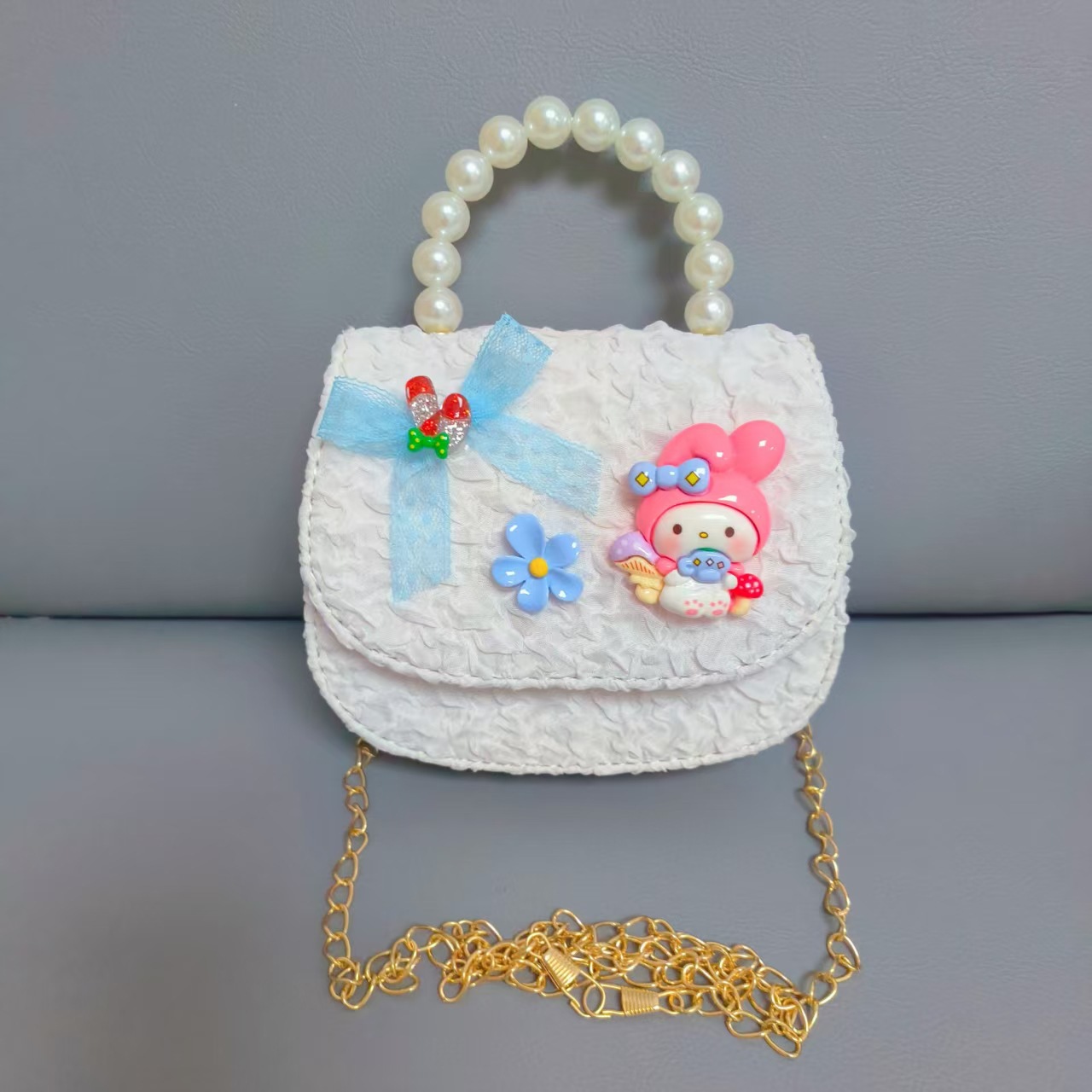 Bow Pearl Princess Handbag Meileti Kulomi Girl Año Nuevo Cartera pequeña bolsa de cadena de viento fragante