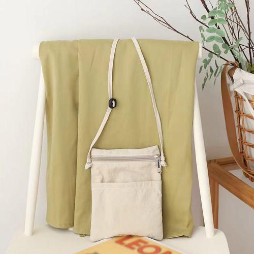 New Japanese-style casual nylon mobile phone bag for women—trendy, versatile, perfect for shopping; lightweight and stylish shoulder/crossbody option.