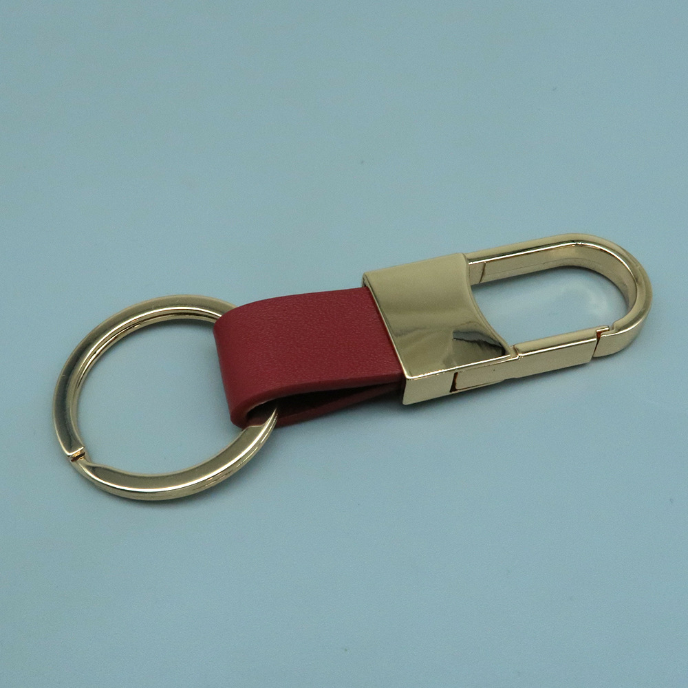 Venta directa de fábrica de llaveros de coche de metal y cuero genuino con logotipo grabado con láser, llaveros creativos. image 26