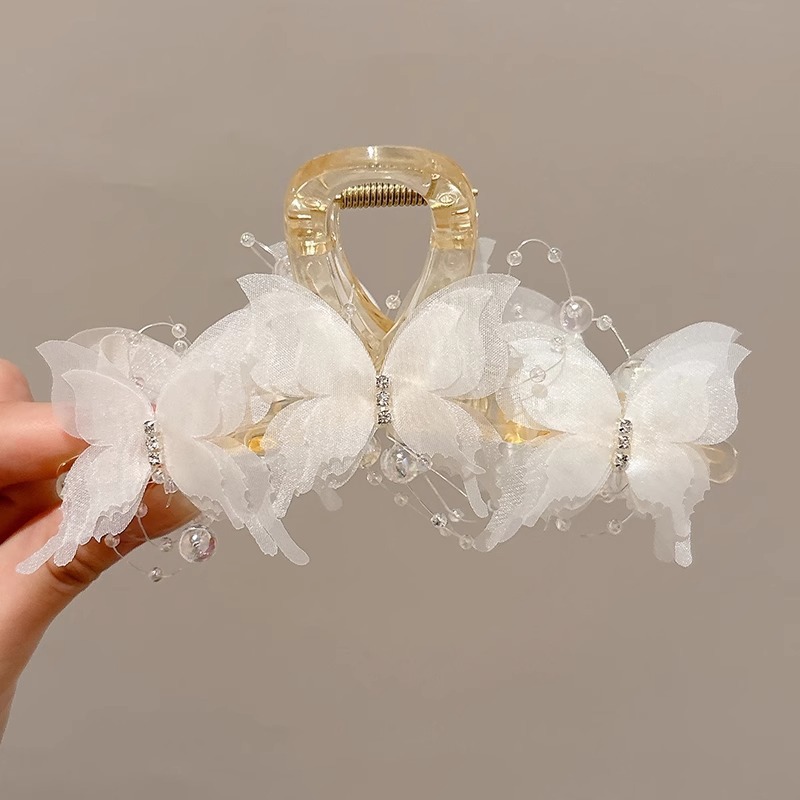 2024 explosión de tiburón clip de plumas clip de cabello de avestruz de alta calidad cabeza de invierno de otoño atrapar cabello de super hadas tocado