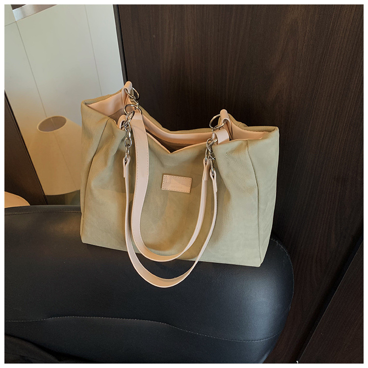 Korean style simple and versatile bag for women, new summer 2025 fashion and niche handbag, large capacity tote bag for commuting undefined