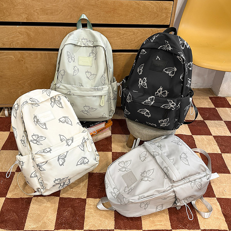 Mochila japonesa de nicho mariposa para mujeres, mochila de clase para estudiantes, mochila de viaje de ocio de gran capacidad para mujeres