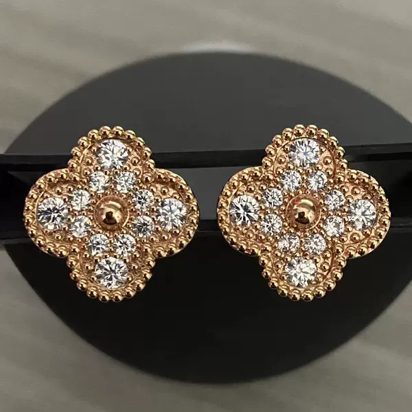 Golden earrings, pink gold, diamond encrusted