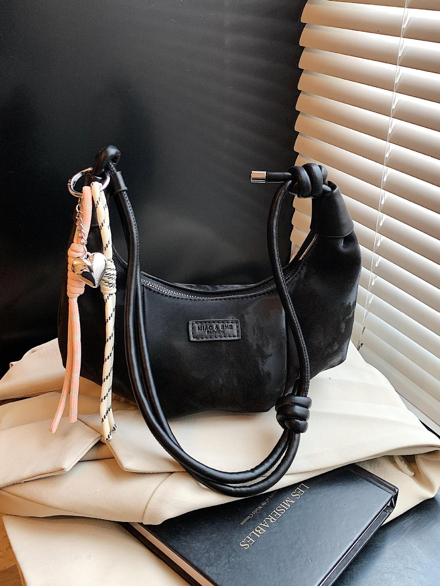 Bolsa de brazo simple coreana para mujeres 2025, nueva bolsa de hombro de empalme extranjero para trabajar, bolsa de mochila ocio