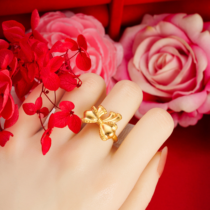 Moda arco collar femenino oído espárragos orquídea anillo mariposa pulsera dulce todo partido pequeño libro rojo mismo estilo de suministro