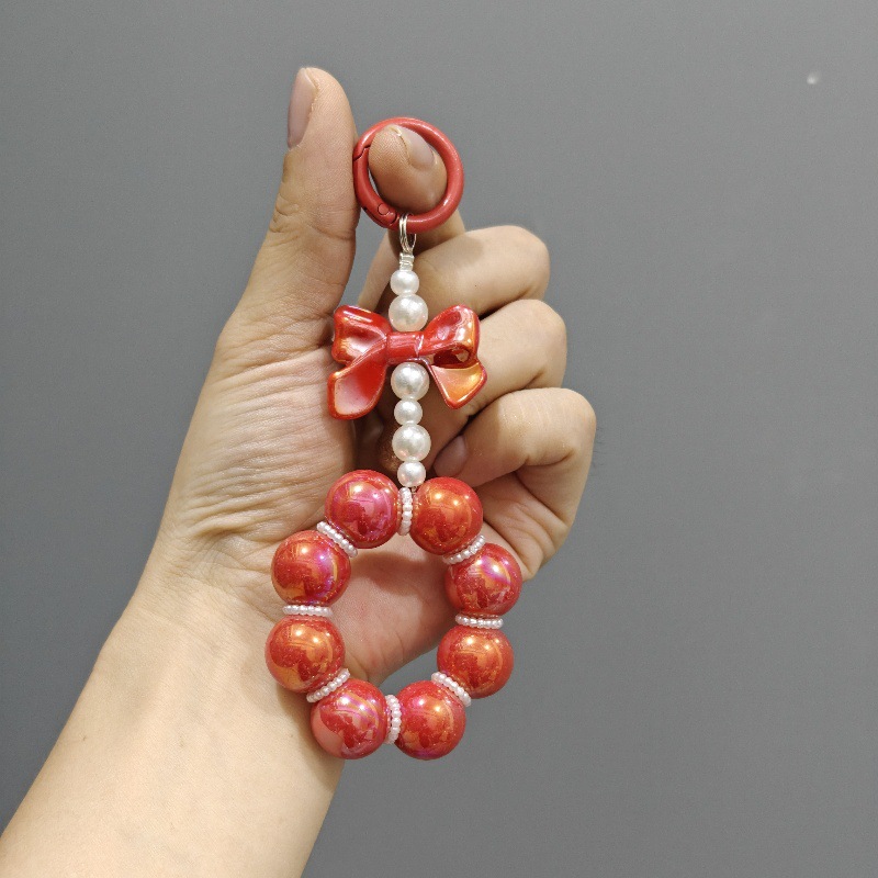 Nueva electrochapado cuentas arco llavero del coche colgante lindo caramelo color pintura anillo de perlas accesorios bolsa Decoración