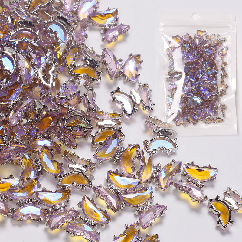 Red famosa nueva mariposa perforación joyas de manicura aleación tridimensional mariposa cristal permeación de hielo insins viento cristal mariposa perforación