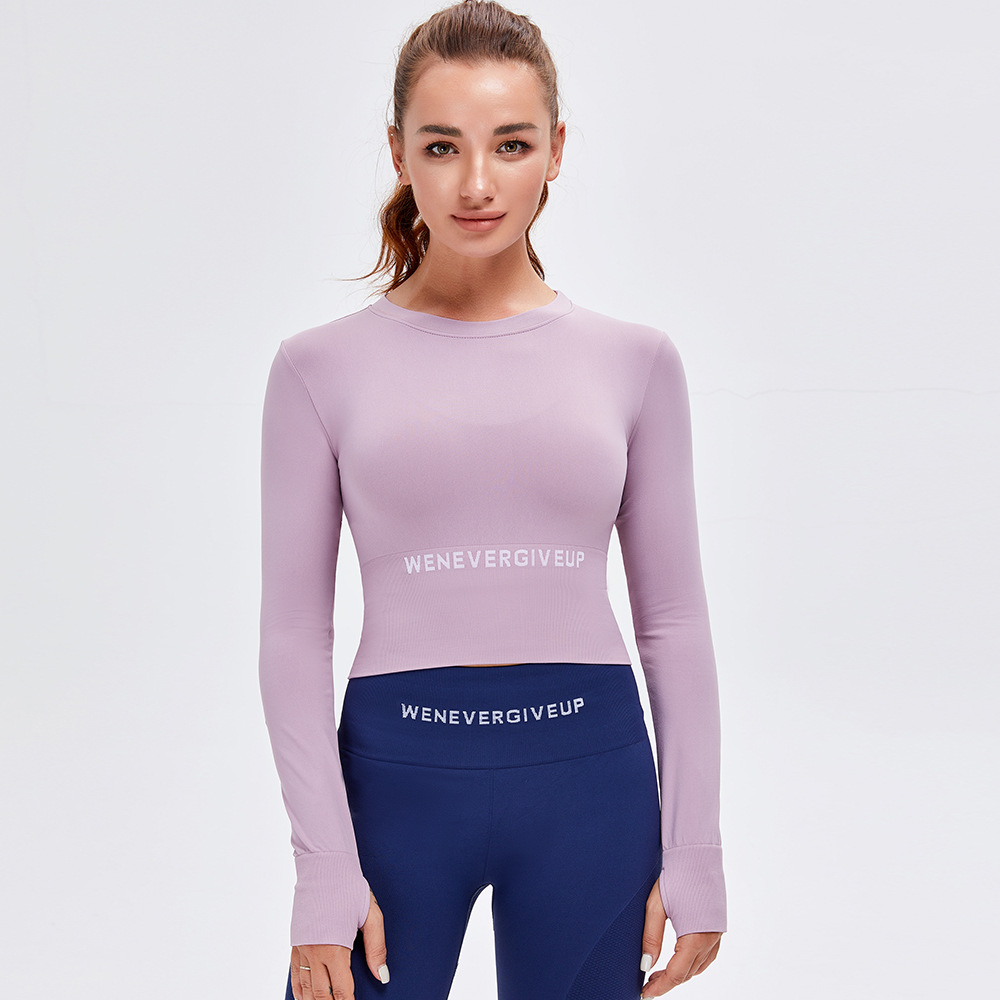 Otoño e invierno europeo y americano Nueva Impresión de letras ropa de yoga sin costuras Top deportivo de manga larga ropa de fitness desnuda ajustada para mujer