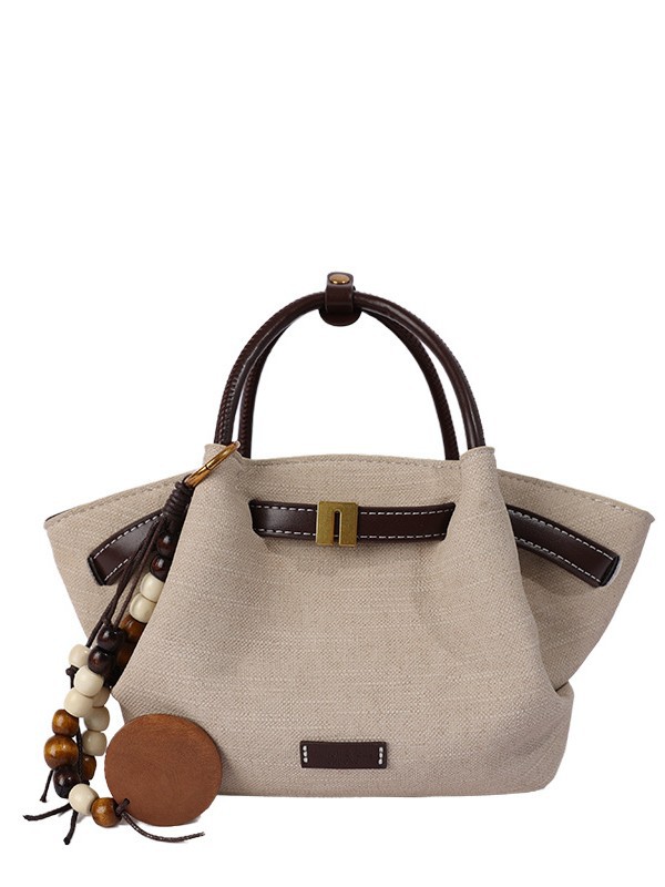 Nicho coreano bolsas de mano tote mujeres 2026 comercio exterior nuevo relajado sensación universal hombro mochila canasta de verduras