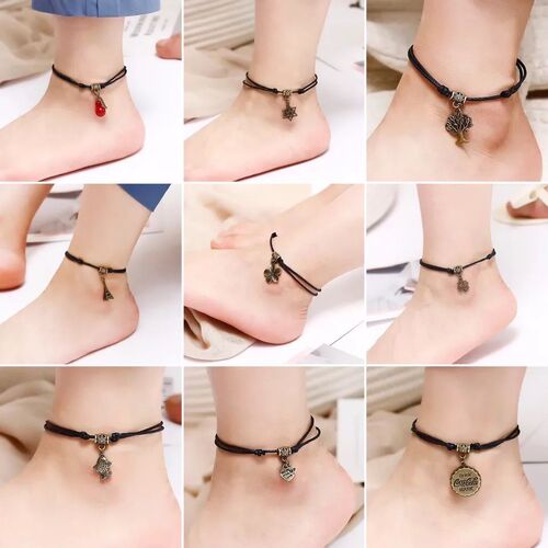 Handmade black ankle chain with simple red rope, designed for students, featuring a bell and agate, vintage ankle chain accessory for the Year of the Monkey.