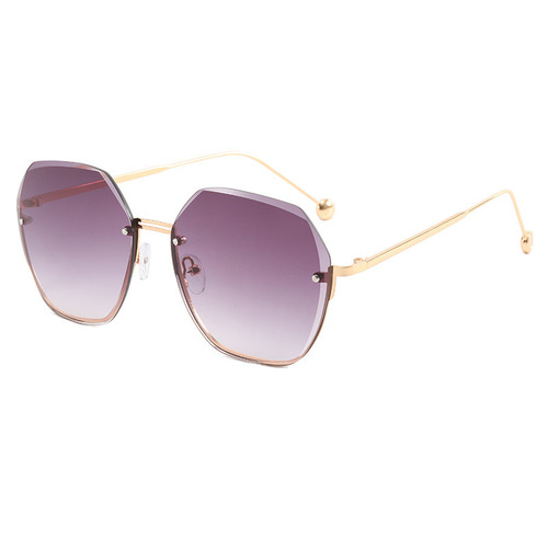 New trendy flat-framed sunglasses with irregular edge and gradient lenses, popular among women for decorative purposes.