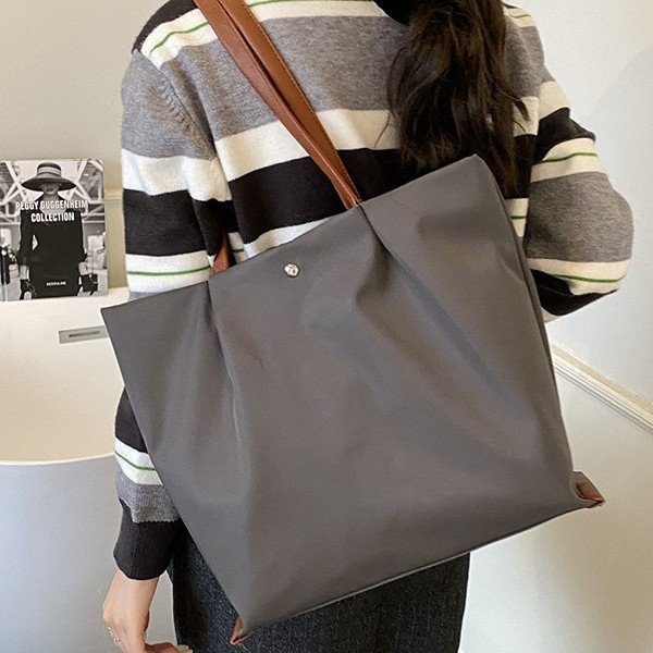 Borsa a tracolla casual da donna in tessuto Oxford, capiente, elegante e versatile, ideale per gli spostamenti quotidiani._voghion.com