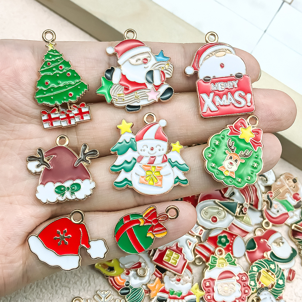 混50个圣诞滴油合金diy饰品配件 圣诞老人雪人铃铛麋鹿手链挂件详情11