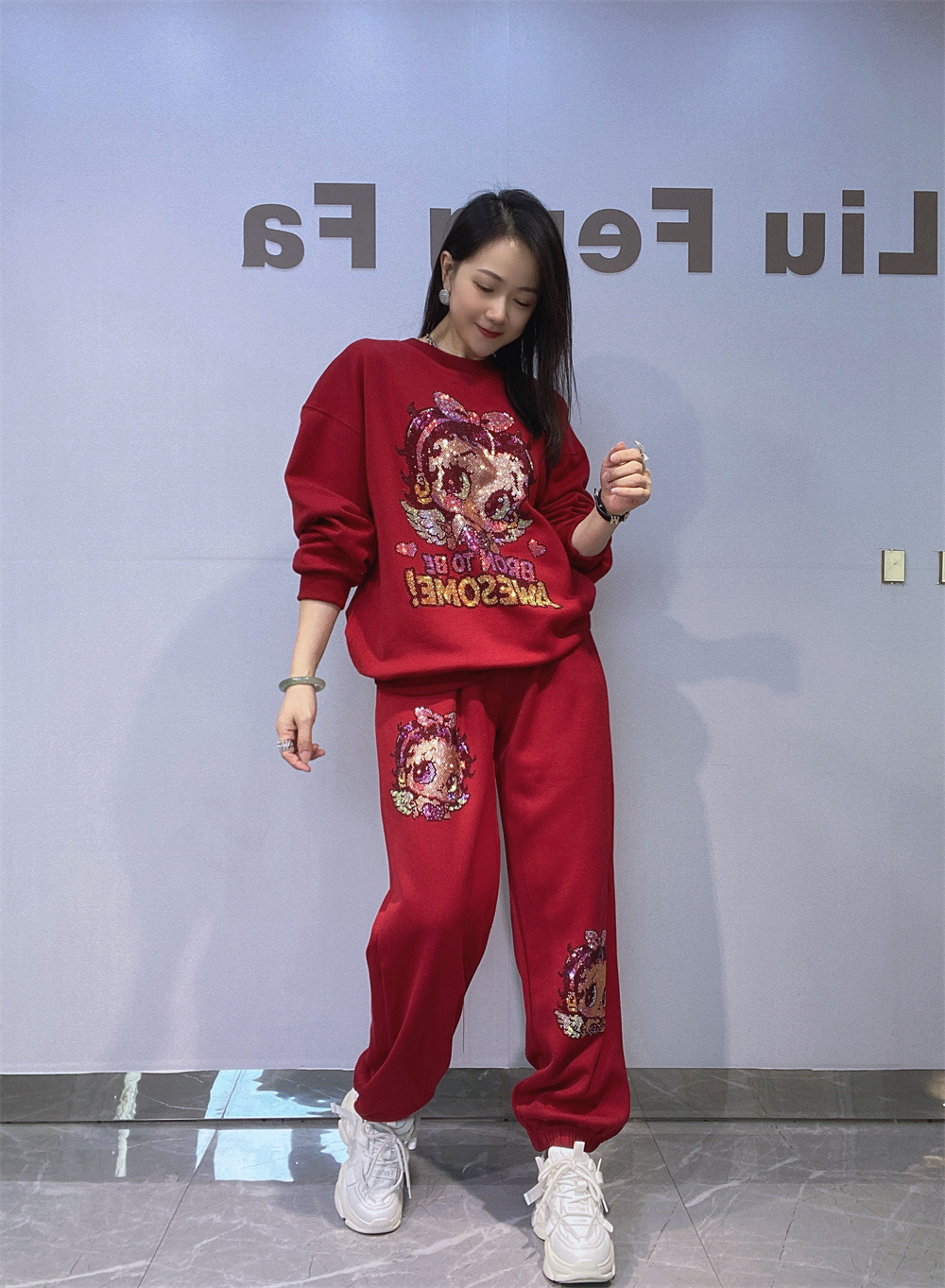 Europa y América ropa de mujer estilo coreano de diamante caliente cuello redondo manga larga suéter de vestir para mujeres de otoño y invierno pantalones sueltos de dos piezas de ropa deportiva