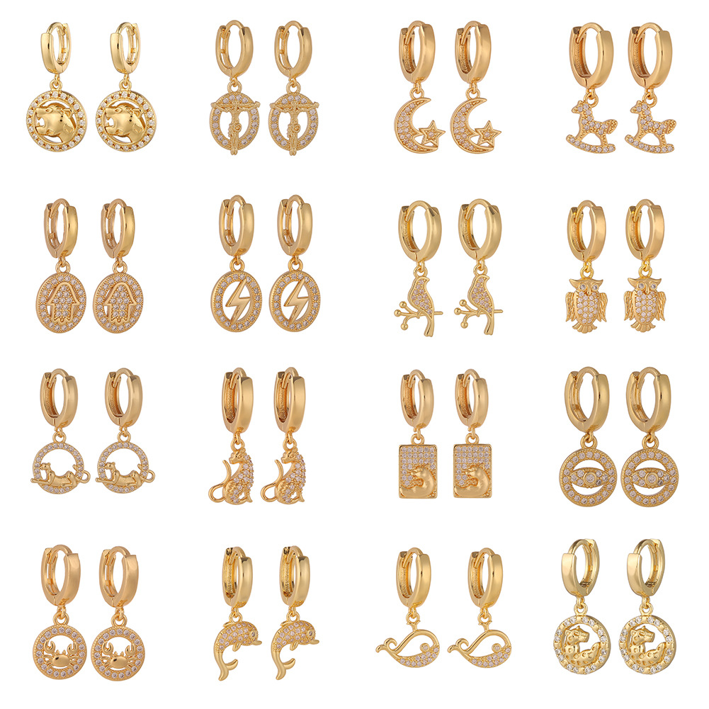 fashionable golden white earrings with zircon