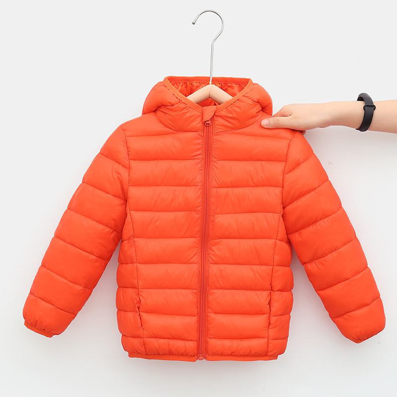 Comercio exterior otoño e invierno nueva chaqueta de algodón de plumón para niños de color sólido para hombres y mujeres, chaqueta de algodón cálida ligera con capucha para niños de mediana edad