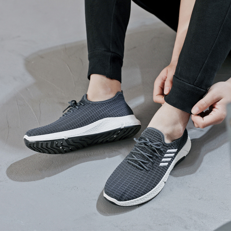 Logo etiquetado personalizado primavera y otoño zapatos de hombre comercio exterior transfronterizo zapatos deportivos casuales de hombre nuevo bajo moldeo por inyección de zapatos de hombre tejidos voladores