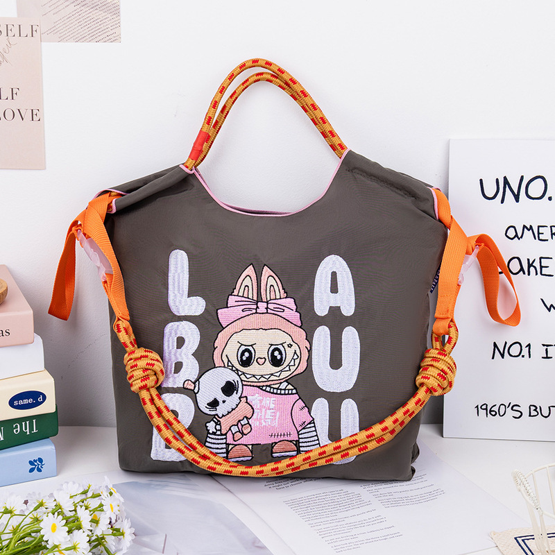 [アップグレードジッパーバッグ] 2025 新しい刺繍ナイロン屋外防水日本製多用途調節可能なクロスボディバッグ女性用|undefined