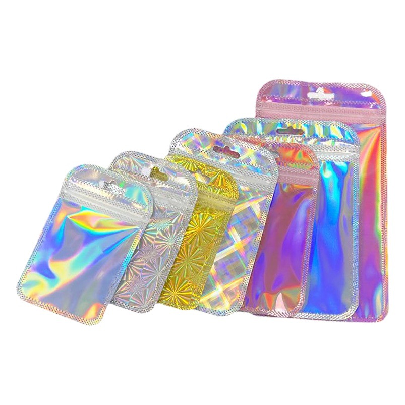 En stock color láser ziplock bolsa de joyería bolsa de película arco iris bolsa de papel de aluminio bolsa de plástico de color mágico fabricante
