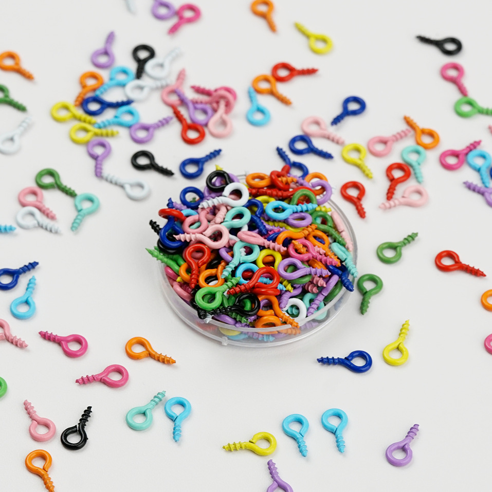 Accesorios de la joyería DIY 100 color spray pintura ovejas cuerno clavo tornillo ojo mirando teléfono caso colgante llavero