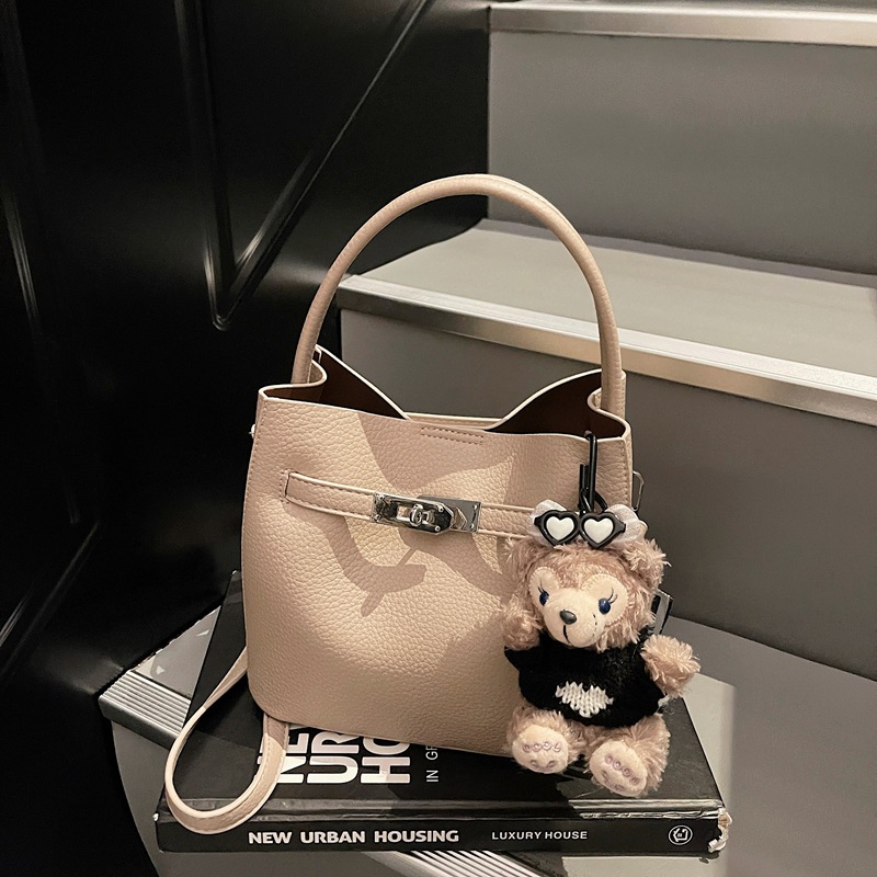 Bolso de mano de alta sensación para mujeres 2025, nueva moda versátil bolso de mochila de gran capacidad de viaje a casa bolso de cubo