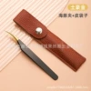 Dolphin black gold leather bag packaging