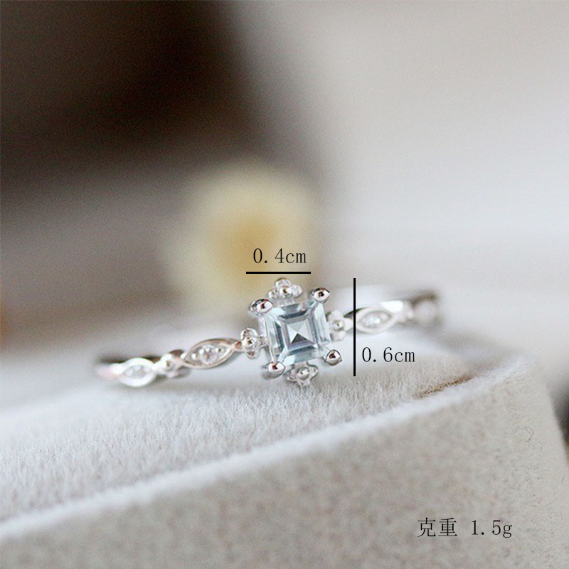 Yunjin transfronterizo nuevo pequeño anillo elegante fresco europeo y americano nicho diamante incrustado Topacio mar azul circón anillo