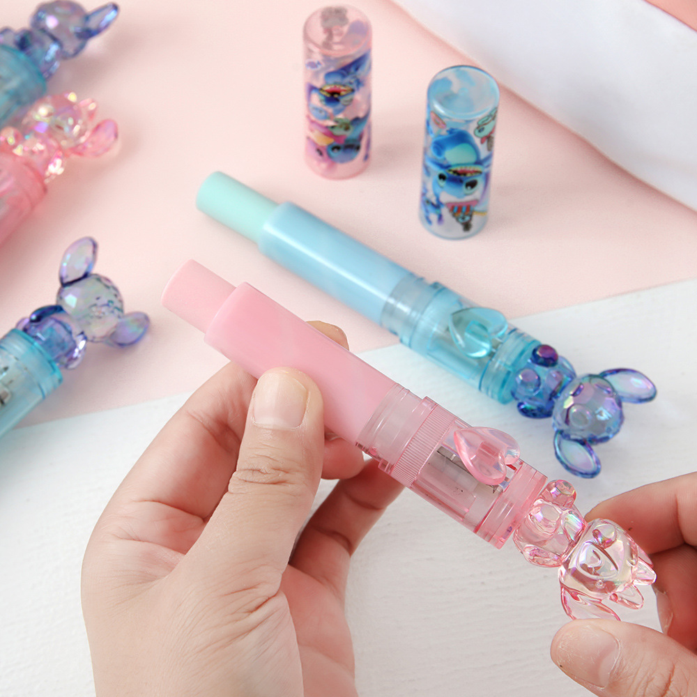 Pequeño borrador de luz azul, caja creativa, borrador de alto valor giratorio fuera del núcleo, material de papelería de aprendizaje para estudiantes de primaria