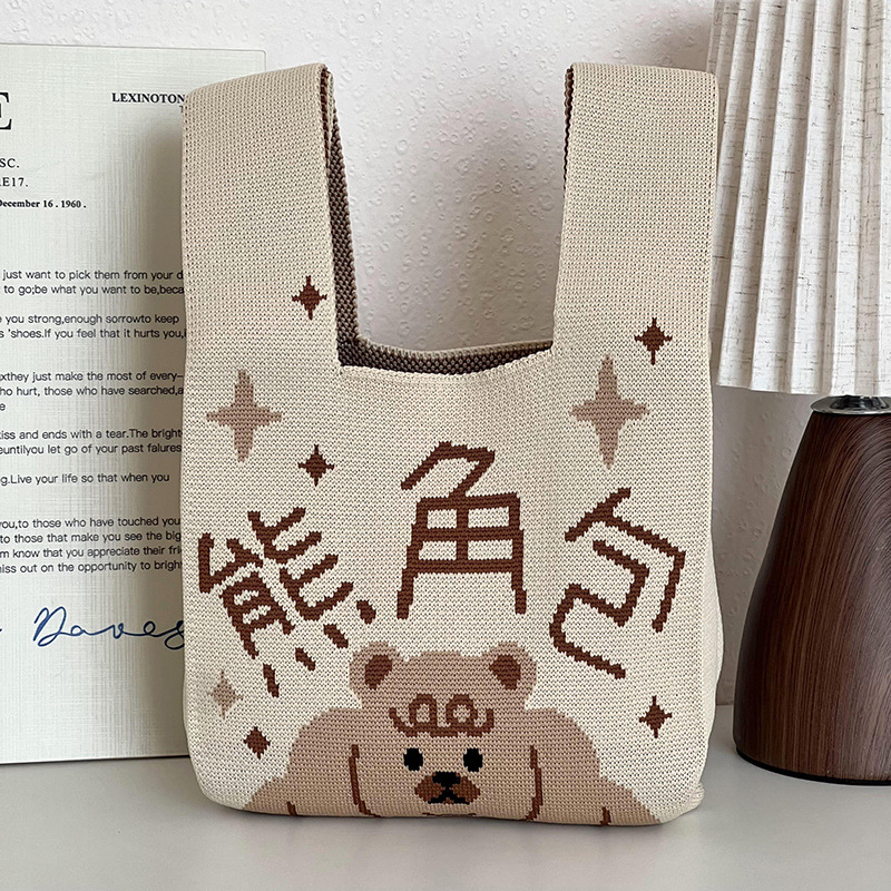 Bolsa de mano de damas nicho diseño de dibujos animados de punto chaleco de punto regalo de mano mochila de hombro al por mayor