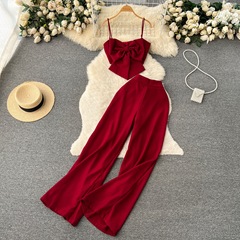 夏服の純色ファッションスーツの女性の蝶結びの胸のストラップの上着のオープンフォークの広い足のカジュアルなズボンの2つのセットのファッション