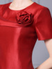 Red formal dress with three-dimensional flower decoration design feeling， buttocks wrapped dress， medium length style
