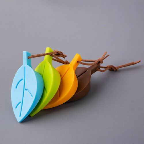 Children's 4-color cartoon leaf door plug anti-pinch device safety supplies infant safety door card silicone door stop