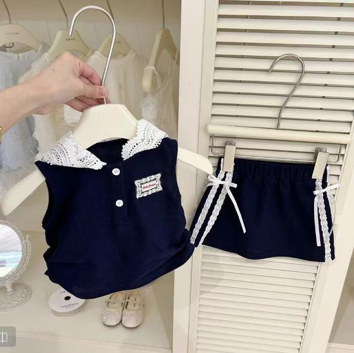Bebé niñas nuevo conjunto de estilo extranjero de verano 2025 nuevo chaleco sin mangas de moda de la escuela dos piezas de falda