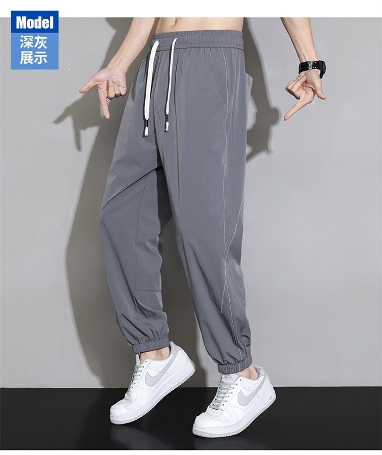 Quần jogger nam bo gấu dài ống bó, chất liệu băng lụa mỏng mùa hè, form rộng thùng thình, phong cách thể thao, nhiều size từ M đến 8XL — màu đen, màu xám đậm, màu kaki chi tiết 19