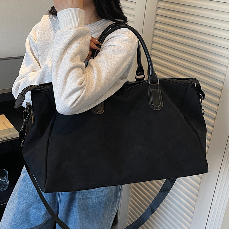 Bolsas de viaje para hombres y mujeres 2025 nuevo bolsas de equipaje de mano de gran capacidad bolsas deportivas de fitness bolsa de almacenamiento al por mayor bolsa al aire libre