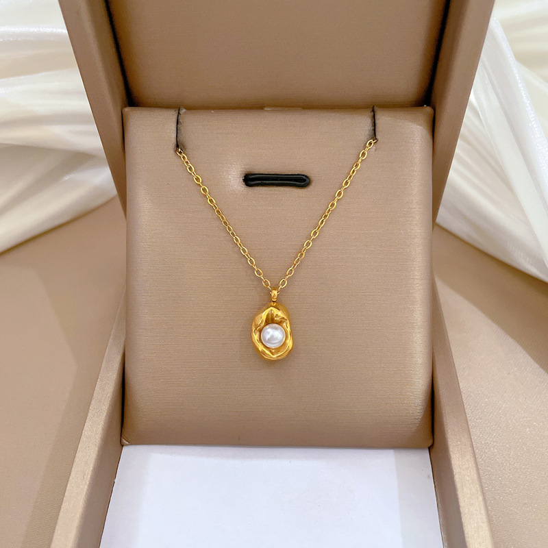 Collana con perle irregolari a forma di uovo catena oro per donna_voghion.com