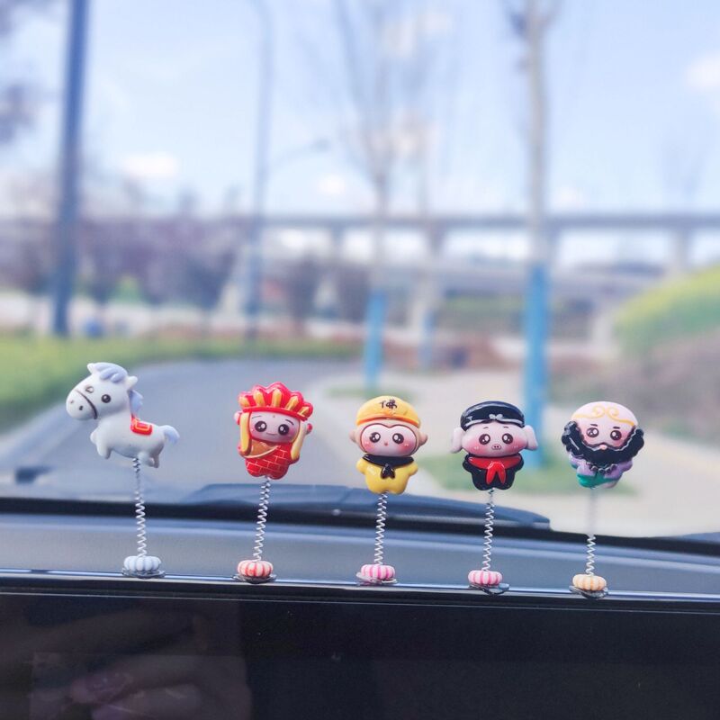 Car shaking head ornaments Journey to the West Monkey King Tang Priest Master and apprentice four-person ornaments center console car accessories rearview mirror
