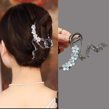 新款樱花波浪抓夹不规则鲨鱼夹后脑勺盘发发抓小众高级感发夹头饰