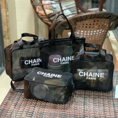 New Chanel-style minimalist letter mesh tote bag with hollow breathable makeup bag for travel, shower, and mother's bag