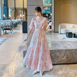 2025夏季新款油画姐妹女装不规则长裙显瘦喇叭袖度假碎花连衣裙女