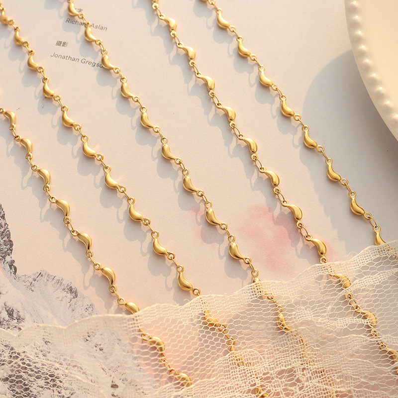 Conjunto de joyería transfronteriza chapada en oro, pequeño animal fresco y dulce europeo y americano, colgante de delfín, collar, material de acero de titanio