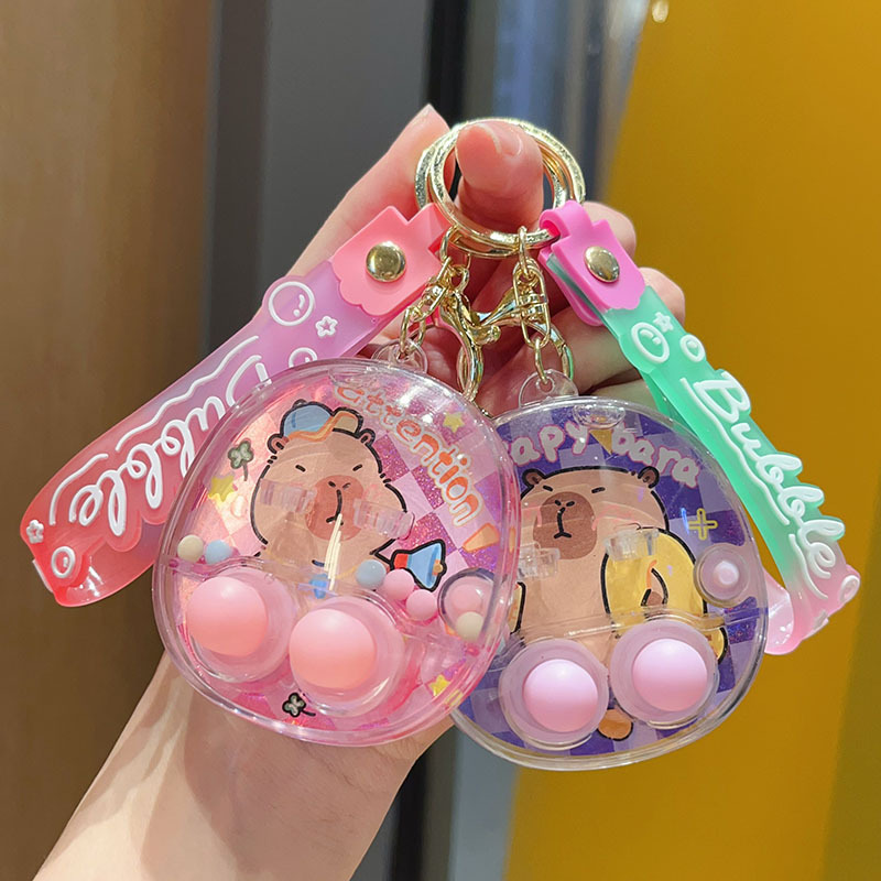 カピ水中シューティングゲーム機キーホルダークレヨンしんちゃんかわいい液体携帯ゲーム機ギフトペンダント|undefined