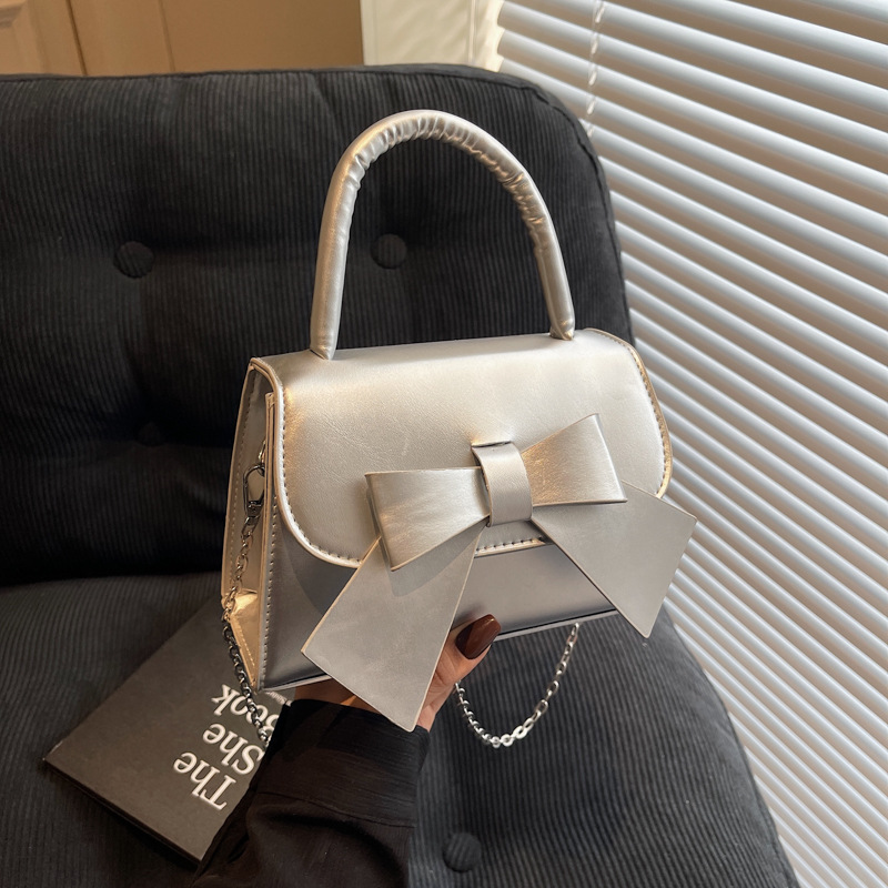 Bolso de mujer 2025 tendencia de verano nueva moda dulce arco de hombro bolso de mano bolso de mano