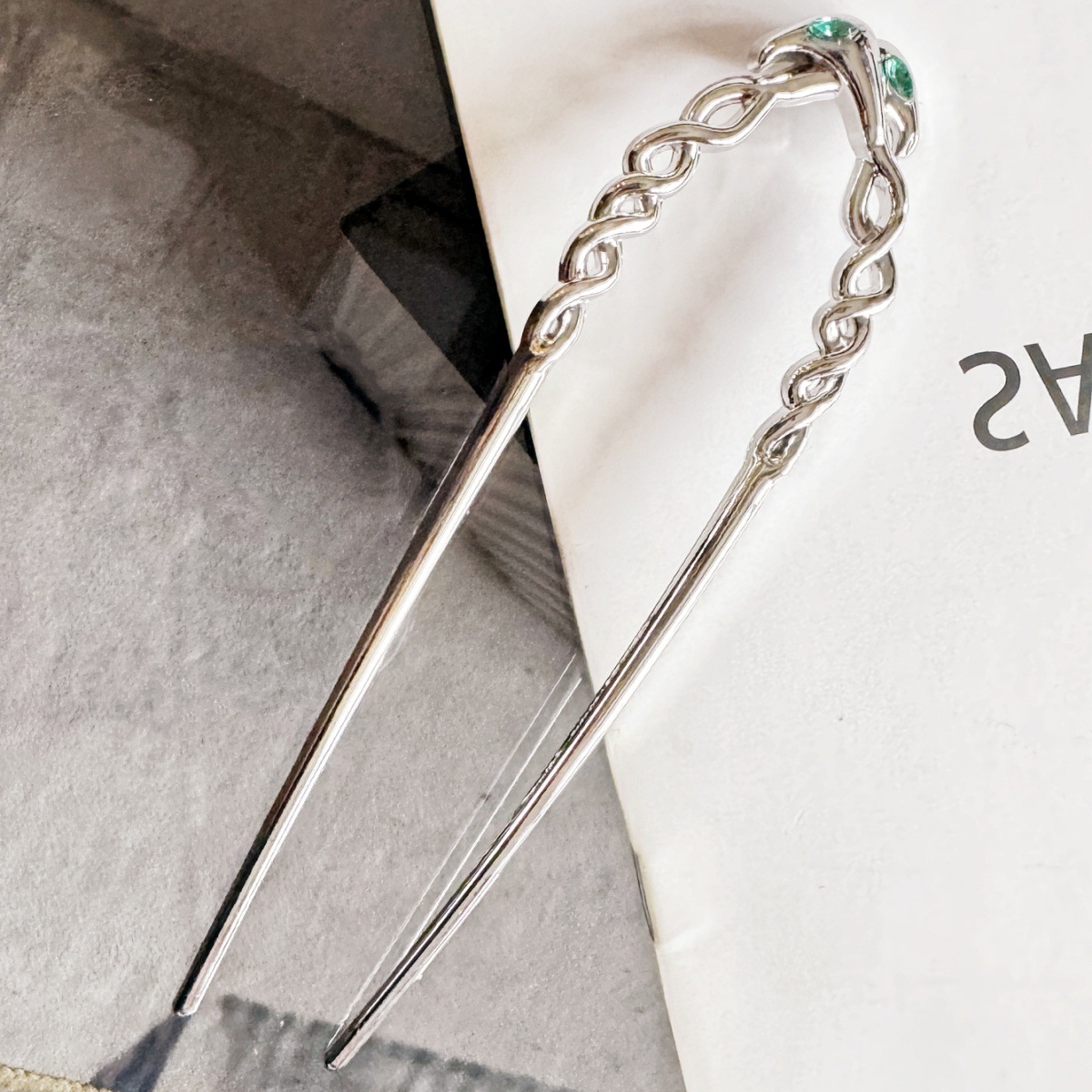 Europa y América clásica sensación de lujo ligero metal en forma de U clip de cabello de tendencia serpentina clip de cabello de torsión diamantes accesorios clip de cabello