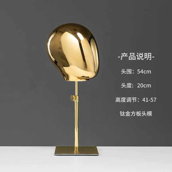 Gold electroplated human head model + gold base